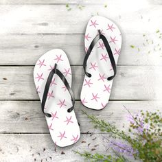 These stylish Pink Starfish flip flops will add some character to your summer escapades. All-day comfort is essential when summer is on. With an easy slip-on design and a cushioned footbed, these flip flops promise to be a summertime favorite. Perfect for heading to the beach or hanging out poolside. .: Materials: EVA, polyester, PVC .: 5/8" (15 mm) thick EVA sole with a textured bottom .: 100% polyester suede sole cover with a black PVC strap .: Runs true to size (see photos for size guide) Car Summer Flip Flops, Beach Flip Flops, Flip Flop Sandals, Starfish, Flip Flops, Wedding Shop, Casual Shoes, Labour Day, Birthday Gifts