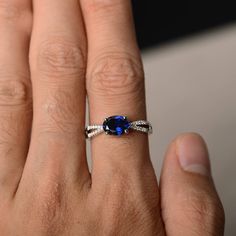 This is a gorgeous handmade creation. Its beauty is its simplicity & Elegance. The 6*8 mm oval shape faceted lab Sapphire is crafted in solid sterling silver and with rhodium plated. Main stone weight about 1.75 ct. CZ as accents. All item is sent in a beautiful gift box If you have any idea of design your ring,pls contact me directly. You can realize more lovely stuff clicking the link https://www.etsy.com/shop/knightjewelry?refshopsection_shophome_leftnav Please leave the correct address a Oval Sapphire Birthstone Ring, Oval Solitaire Sapphire Ring, Oval Sapphire Solitaire Promise Ring, Oval Sapphire Solitaire Birthstone Ring, Oval Sapphire Solitaire Jewelry, Oval Sapphire Ring With Center Stone In Sterling Silver, Oval Lab-created Sapphire Ring With Center Stone, Oval Sapphire Ring In Sterling Silver, Oval White Gold Ring With Lab-created Sapphire