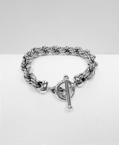 "925 Sterling Silver thick Rope Chain Bracelet Classic model, A timeless, unchangeable moderate design. High end, Handcrafted Silver smith work. made : 925 Genuine Sterling Silver (Not Silver plated, Nor silver coated) Solid, Twisted handcraft design. Length: 8 1/4 , 8 1/2 , 8 3/4 or 9\" Weight : approx. 57.9 g and up Rope Thickness: 10.5 mm (0.41 inch)" Classic Sterling Silver Bracelet With Toggle Clasp, Classic Sterling Silver Chain Bracelet With Solid Links, Classic Sterling Silver Chain Link Bracelet, Silver Chain Link Bracelet With Toggle Clasp, Classic Silver Chain Bracelet With Toggle Clasp, Silver Sterling Chain Bracelet With Toggle Clasp, Sterling Silver Bracelet With Toggle Clasp For Formal Occasions, Silver Chain Bracelet With Toggle Clasp For Formal Occasions, Classic Silver Jubilee Chain Bracelet