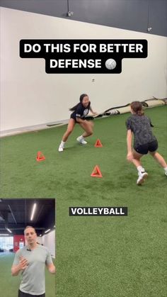 two women are playing with cones in an indoor field