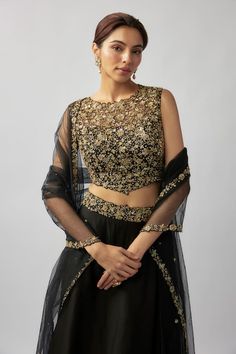 Black silk organza lehenga with an attached cancan and  zardosi, sequins, cutdana, crystal beads and zari hand embroidered waistband. Comes with a padded blouse and a tulle dupatta. - Aza Fashions Sleeveless Sharara With Sheer Dupatta For Evening, Wedding Black Pre-draped Saree With Intricate Embroidery, Bollywood Style Tissue Silk Sharara For Evening, Bollywood Style Organza Evening Sets, Evening Lehenga With Sheer Dupatta, Bollywood Style Evening Organza Sets, Party Choli With Resham Embroidery In Tissue Silk, Organza Anarkali Set With Dupatta For Evening, Bollywood Style Tissue Silk Sets For Evening