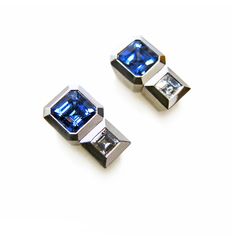 Stone Earrings - Exuding artful elegance, these earrings captivate with their architectural design that frames 1.68tcw emerald-cut blue sapphires and 0.3tcw step-cut diamonds in brushed platinum. Sapphire studs can be worn alone or with diamond jackets. Platinum post backs. Earrings Platinum, Stud Earrings Diamond, Sapphire Stud Earrings, Blue Sapphire Studs, Sapphire Earrings Studs, Cut Earrings, Sapphire Studs, Step Cut, Men Earrings