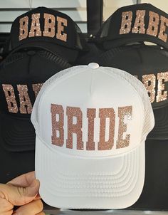 Bridesmaids Hat, Bride Squad Custom Trucker Hats, Bachelorette Trucker Hat, Baseball caps for Bride, Matching Tracker Cap, Bridal Party Caps Custom TEXT customer  1. Choose your Hat Color 2. Choose your Text Color 3. Enter your custom text in the "Personalization" section with your font style *PLEASE TYPE IT EXACTLY HOW YOU WANT ON YOUR HAT WITH UPPERCASES, LOWERCASES, AND SPACING* ----------------------------------- Custom LOGO customer *Please show us your logo prior purchasing* 1. Choose your White Snapback Party Hat, White Snapback Hat For Party, White Adjustable Baseball Cap For Party, Adjustable Party Cap, Adjustable Cap For Party, Adjustable Trucker Hat For Wedding, White Trucker Baseball Cap For Party, White Snapback Trucker Hat For Party, Bachelorette Party Adjustable Trucker Hat