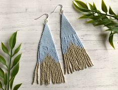 Opaque Matte Periwinkle Light Blue Seed Beads || Opaque Metallic Silver Glass Beads This pair of fringe seed bead earrings is a trendy way to add a pop of color or pattern into your wardrobe, or to give as a gift. Each earring was expertly handwoven together by a peyote stitch using delica seed beads and nylon thread. The bottom of each earring has the most beautiful swooshy fringe to finish off the earring. The pattern or color combinations were chosen to compliment each other, and give some interest to each piece.  The size of each earring is 1 inch wide by 3.75 inch tall. Together with the sterling silver ear wires, these earrings have a total drop length of 4.25 inches. Duster Earrings, Shoulder Duster Earrings, Blue Beaded Earrings, Beadwork Earrings, Yellow Earrings, Delica Beads, Seed Bead Earrings, Fringe Earrings, Geometric Earrings