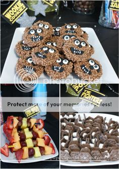 a table topped with lots of desserts covered in googly eyes and candy bars