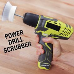 a cordless drill is being used on a wooden surface with the words power drill scrubber