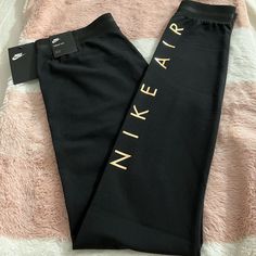 Brand New. Nike Womens Tight Fit Leggings With Rose Gold Metallic Nike Air Logo. Please Give Me An Offer If Interested. Nike Fitted Bottoms For Loungewear, Black Stretch Nike Bottoms, Nike Black Stretch Bottoms, Nike Casual High-stretch Bottoms, Nike Stretch Long Pants, Nike Compression Full-length Bottoms, Nike Stretch Bottoms, Fitted Nike Black Tights, Black Stretch Nike Tights