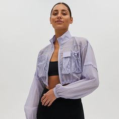 Cropped Semi Sheer Workout Jacket! Size Is M But Could Fit A S/M. Never Worn! Nwot. Spring Nylon Long Sleeve Utility Jacket, Spring Nylon Utility Jacket With Long Sleeves, Fall Nylon Tops With Pockets, Spring Nylon Tops With Pockets, Spring Nylon Tops For Work, Spring Nylon Tops For Workwear, Workout Jacket, Utility Jacket, Bra Tops