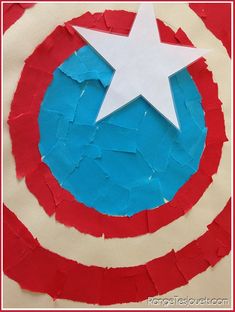 the captain's shield is made out of red, white and blue tissue paper