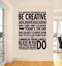 a wall decal with the words be creative in black and white, above a dining room table