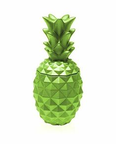 a green pineapple shaped glass container on a white background