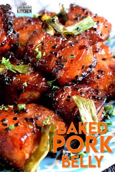 baked pork belly on a blue and white plate