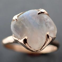 This beautiful Moonstone ring is home tumbled. I created this setting in wax then cast it in recycled solid 14k Yellow gold at my home studio. This ring is a size 7 it can be resized up or down.  it measures about 10mm X 11mm I created a rustic texture in the gold. The bands width is about 2mm. Throughout all time and history, in every tribe and culture all around the world crystals, minerals and gemstones have used for healing, luck, divination, adornment vibrational medicine and so much more. Vibrational Medicine, Rustic Texture, Minerals And Gemstones, White Band, 14k Gold Ring, Ring Gemstone, Moonstone Ring, Crystals Minerals, Moon Stone