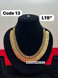 sizes in terms of height and weight are mentioned in grams and inches in the photo Gold Dual-tone Jewelry For Puja, Heavy Gold Bollywood Necklaces, Gold Kundan Necklace With Tilla For Puja, Heavy Gold Bollywood Necklace, Gold Heavy Bollywood Necklace, Gold Bridal Necklace With Latkans, Gold Plated Tilla Necklace For Puja, Gold Dual-tone Temple Necklace For Puja, Ceremonial Gold Brass Choker