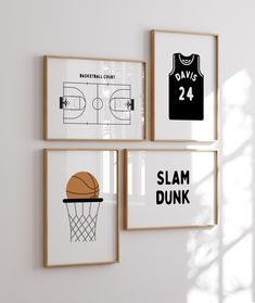 three framed basketball posters hanging on the wall