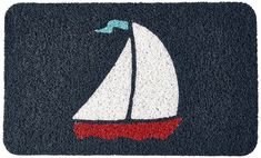 a door mat with a sailboat painted on the front and side of it,