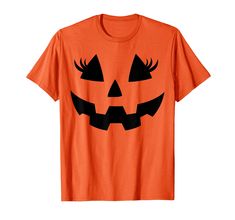 an orange halloween t - shirt with black eyes and a pumpkin on it's face