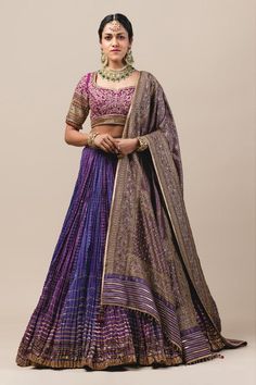 Light purple crushed lehenga with gota texturing.  Comes with mukaish embroidered blouse enhanced with aari-sequin work, French knots and meenakari brocade dupatta highlighted with kasab and kundan embllishments. 
Component: 3
Embroidered
Neckline: U Neck
Sleeve Length: Half
Fabric: Brocade, Chanderi
Color: Purple
Tassel tie-up back
 - Aza Fashions Mukaish Embroidery, Brocade Dupatta, Chanderi Lehenga, Chania Choli, Lehenga Bridal, Raw Silk Lehenga, Sabyasachi Lehenga, Half Sarees, Sequins Fabric