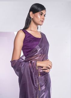 Product Features: Saree Color: Mauve Saree Fabric: Organza Blouse Color: Mauve Blouse Fabric: Art Silk Work: Solid Wash Care: Dry Clean Occasion: Festivewear, Partywear, Casual Product Type: Saree Disclaimer: There will be slight difference in digital to actual image Party Purple Silk Pre-draped Saree, Party Pre-draped Saree With Padded Blouse, Elegant Sheer Blouse For Party, Fitted Party Top With Sheer Dupatta, Fitted Top With Sheer Dupatta For Evening, Sheer Blouse Piece For Party, Sheer Blouse Piece For Wedding, Summer Party Saree With Unstitched Blouse, Fitted Organza Blouse For Diwali