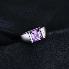 Minimalist yet eye-catchy, this artisanal polished alexandrite is a ring with Old World Glamor. It is a stone for positive and harmonious vibrations. Alexandrite men's ring cleans evil and negative thoughts while attracting wisdom and knowledge into your life. Alexandrite ring is polished to perfection to bring the purple vibrations of abundance and prosperity into your life. This alexandrite ring meaning is harmony and wealth. It leads you to luck and good fortune. To Physically Clean your Alex Modern Silver Amethyst Gemstone Ring, Modern Sterling Silver Amethyst Ring With Polished Finish, Minimalist Silver Crystal Ring For Formal Occasions, Modern Sterling Silver Crystal Ring For Formal Occasions, Modern Sterling Silver Amethyst Ring, Modern Sterling Silver Crystal Gemstone Ring, Modern Crystal Gemstone Ring In Sterling Silver, Modern White Gold Sterling Silver Crystal Ring, Modern Sterling Silver Sapphire Ring As A Gift