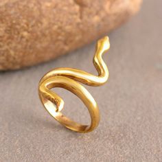 Adjustable Snake Ring, Gold Ring, Minimalist Ring, Gold Snake Ring, Gift For Her, Wedding Party Gift, Serpent Ring Metal:-Brass 1. Please share your numbers (in personalization box ) as required for shipping address details, and it'll help us to contact you easily. And don't worry about the privacy, we'll keep it safe with us, So try to cooperate with us. :) 2.Customers' satisfaction is our biggest priority, please contact us with any questions/queries for future or existing orders, and we will do our best to make sure you are happy with your order. 3.Please make sure to add the correct address during checkout. You can return your purchased item within 15 days after successful delivery. We offer a 100% "Money Back Guarantee" if you are not satisfied with your purchase. Return charges will Unique Hand Forged Snake Ring, Unique Hand Forged Snake Ring As Gift, Snake Shape Metal Ring As Gift, Handmade Adjustable Snake Shape Rings, Handmade Adjustable Snake Ring As Gift, Handmade Snake Open Ring As A Gift, Handmade Open Snake Ring As Gift, Handmade Open Snake Ring Gift, Handmade Open Snake Ring For Gift