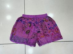 Handmade ITEM Night Wear Patch Work shorts, comfort pant short pant young look pant handmade pant, boho hippie patch work short hot pant, indian short WELCOME TO MY SHOP Product Detail :- Handmade Item Item Name :- Patchwork Shorts Material :- Rayon Size :- Length- 16-18 inches Waist - Fit 20 upto 40 elastic Color :- As a picture (Variation Of Patches ) Waist style: regular closure type: elastic with drawstring This patchwork Shorts was made to look , handmade with different patterns. It comes w Summer Festival Shorts With Patchwork, Hippie Patchwork Shorts For Festival, Bohemian Patchwork Shorts, Pink Bohemian Patchwork Bottoms, Pink Bohemian Short Bottoms, Patchwork Short Bottoms For Festival, Traditional Cotton Shorts For Summer, Pink Bohemian Shorts For Vacation, Pink Short Bottoms For Festival