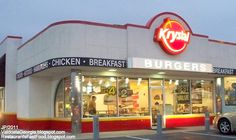 a fast food restaurant with the lights on