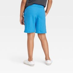 Your child will be ready for warm-weather days in these Pull-On Knit Shorts from Cat & Jack™. Crafted from a soft cotton-blend fabric, these regular-rise shorts offer them cool comfort, and they're designed with a flexible drawstring to help them find a secure fit. Best of all, these above-knee shorts feature two side pockets for added functionality. They can coordinate them with a variety of their tops for versatile casualwear options. Cat & Jack™: Classics with an imagination of their own. Knee Shorts, Weather Day, Jogger Shorts, Nice Shorts, Soft Shorts, Knit Shorts, Cat & Jack, Above Knee, Warm Weather