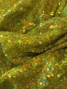 Beautiful sequins fabric. 3 mm sequins. Little stretchy. Width is 56-60”. Sold by yard. Holiday Disco Sequin Fabric With Glitter, Gold Sequin Fabric With Glitter Print For Party, Festive Shimmer Sequin Fabric, Glamorous Glitter Sequin Fabric For Festive Occasions, Festive Gold Sequin Fabric, Glamorous Festive Sequin Fabric, Green Glamorous Sequin Fabric For Festive Occasions, Glamorous Green Sequin Fabric For Festive Occasions, Festive Holiday Sequin Fabric