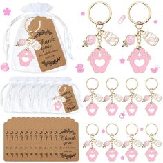 a bunch of key chains and tags with thank you written on them in the shape of hearts