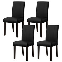 four black leather dining chairs with wooden legs