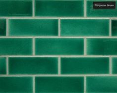 a green tile wall with a sign that says turquoise green on the bottom right corner