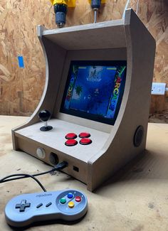 Portable Bartop Arcade.  Easy to assemble case and add your components and you have a portable Arcade.  It can be stationary or battery powered depending on how you build. Needs assembly.  Only 1 phillips screwdriver and 15 minutes of time and you will have an assembled case ready for your components and design theme.  A template for the pieces can be supplied if needed to help with artwork designs. ATTENTION:  This is the case only.  No electronics or components included.  Build your own arcade with this kit.  Bolts and screws included.  You need to only add your components.  See pic for an idea of what components are needed.   This cabinet is designed to fit an Ipad LCD screen which can be connected to a raspberry pi.  Other monitor panels can be designed, just let me know the specs you Panel Layout Design, Arcade Bartop, Cabinet Build, No Electronics, Mini Arcade, Arcade Cabinet, Phillips Screwdriver, Design Theme, Tech Tips