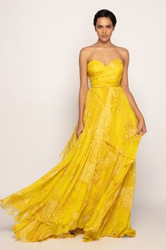 Yellow chiffon periwinkle bandhani print, multi layered strapless dress.
Components: 1
Pattern: Print
Type Of Work: Bandhani
Neckline: Sweetheart Neck
Sleeve Type: Strapless
Fabric: Chiffon
Color: Yellow
Other Details: 
Multi layered flare
Occasion: Resort - Aza Fashions Bandhani Print, Wedding Guest Gowns, Dreamy Gowns, Yellow Gown, Indian Fabric, Strapless Gown, Asymmetrical Skirt, Sweetheart Neck, Blouse Styles