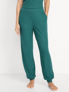 rib-knit waistband hip pockets banded rib-knit cuffs pull-on style sits at belly button loose hip and thigh tapered leg 28" regular inseam 26" petite inseam 31" tall inseam models are approx.  5'9" and wear sizes s (4), l (12), and xl (18)machine wash according to the care instruction label Relaxed Fit Pull-on Bottoms For Loungewear, Full-length Loungewear Bottoms With Elastic Waistband, Cotton Wide-leg Sleepwear For Lounging, Cotton Pull-on Bottoms For Loungewear, Relaxed Fit Pull-on Joggers For Loungewear, Pajamas Gift, Family Pajamas, Old Navy Women, Family Maternity