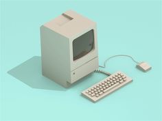 an old computer sitting on top of a blue surface next to a keyboard and mouse