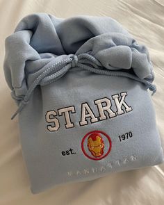 a gray blanket with the name stark on it