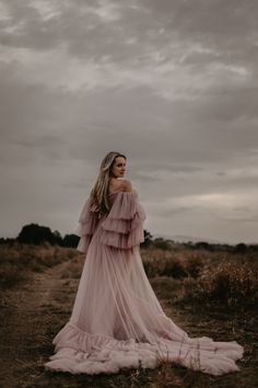 Introducing our exquisite collection of Boho-inspired maternity gowns, thoughtfully designed to make your maternity photoshoot a truly enchanting experience! 🌸✨ 👗 Elevate your Boho session with our stunning Boho dress, expertly crafted from the finest natural fabrics to ensure comfort and a seamless fit throughout your pregnancy journey. 📸 Capture the most beautiful moments with our curated selection of photo props, adding a touch of whimsy and charm to your maternity session. Your photographs will exude elegance and grace, reflecting the joy of this precious time in your life. 🤰 Embrace the ethereal beauty of our Vintage dress, a timeless piece that celebrates the essence of motherhood. Its delicate lace and flowing silhouette perfectly complement your radiant pregnancy glow. 🌿 At Ma Maternity Maxi Dress With Ruffles For Wedding, Elegant Maternity Dress With Ruffles For Wedding, Wedding Maternity Dress With Ruffles, Floor-length Maternity Dress With Ruffles For Wedding, Floor-length Ruffled Maternity Dress For Wedding, Ethereal Floor-length Gown For Wedding Night, Photo Shoot Maternity, Boho Maternity Dress, Dress Medieval