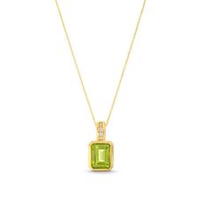 This Emerald Cut Peridot Pendant Necklace is a stunning shade of green, featuring an emerald cut peridot weighing approximately 2.75 carats. Luxury Green Diamond Gemstone Necklace, Luxury Green Gemstone Diamond Necklace, Luxury Green Diamond Necklace With Gemstone, Luxury Green Diamond Necklace For May Birthstone, Fine Jewelry Green Diamond Gemstone Necklace, Green Gemstone Diamond Necklace In Fine Jewelry Style, Formal Green Gemstone Diamond Necklace, Emerald Cut Green Diamond Gemstone Necklace, Classic Green Necklace With Rectangular Pendant