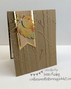 a close up of a card with a butterfly on the front and back of it