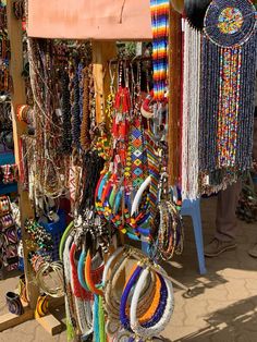 many bracelets and necklaces are on display