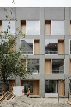 an apartment building with multiple balconies on the front and second story is being constructed