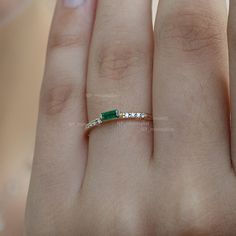 This ring is made with genuine emerald gemstone & SI Clarity G-H Color Diamond and 14K solid yellow gold * SKU: SGR00466 * Made to Order. * Gold Purity: 14K Solid Yellow Gold (stamped) * Custom Gold Color: Yellow, Rose, White Gold * Custom Gold Purity: 9K/14K/18K (Charges Apply) * Diamond 100% Genuine Diamond * Diamond Weight: 0.07 ct. * Diamond Color: G-H * Diamond Clarity: SI1- SI2 * Diamond Cut: Brilliant Cut (Excellent) * Emerald Weight: 0.02 ct. Product Measurements:- Ring Size: 2 to 10 14k Gold Emerald Ring With Baguette Cut, Emerald Ring With Baguette Diamonds In 14k Yellow Gold, Emerald Cut Baguette Diamond Jewelry For May Birthstone, Emerald Ring In 14k Yellow Gold With Baguette Diamonds, Emerald Cut Baguette Diamonds May Birthstone Jewelry, 14k Gold Baguette Cut Emerald Ring For May Birthstone, Dainty Emerald Ring With Diamond, Green 14k Gold Jewelry With Baguette Diamonds, 14k Gold Jewelry With Green Baguette Diamonds