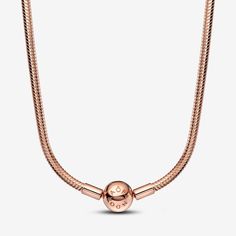 Say hello to your new jewelry box staple with the Pandora Moments Snake Chain Necklace. Hand-finished with 14k rose gold plating, this simple yet elegant design features Pandora’s iconic snake chain pattern and a ball clasp embossed with the Pandora logo. Wear it on its own or style with a Pandora O Pendant and keep your favourite charms close to your heart. Pandora Moments Snake Chain Necklace - Size 16.5 In Charm | Gold | 382234C00-42 Pandora O Pendant, Charms Disney, Pandora Logo, Pandora Essence, Pandora Necklace, Logo Wear, Bracelet Tennis, Minimal Necklace, Snake Chain Necklace