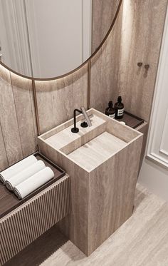 a bathroom with a sink, mirror and towel rack on the wall next to it