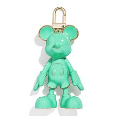 BAUBLEBAR Disney Mickey Mouse Monochromatic Green Bag Charm A must-have Disney accessory, the glossy and monochromatic Mickey Mouse Bag Charm is an especially stylish touch of Disney for wherever you go! Movable head, arms and legs make the charm extra fun. And the chain-linked clasp is super-easy to clip onto handbags, backpacks, totes and more.       Approx. 3"L x 2"W     Polished finish      Chain-linked clip clasp     Green enamel throughout with goldtone detailing Mickey Mouse Bag, Disney Accessories, Green Enamel, Disney Mickey Mouse, Green Bag, Disney Mickey, Charm Jewelry, Super Easy, Backpacks