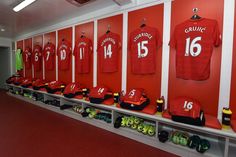 the dressing room is full of red jerseys