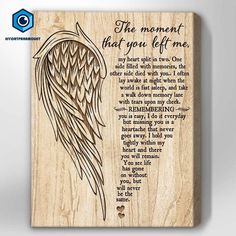 a wooden plaque with an angel's wing on it and the words, the moment that you left me