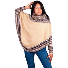 Turtleneck poncho for women, made with alpaca wool. An alpaca and wool yarn are intertwined to create a roomy and elegant poncho. This garment stands out for its incomparable softness and ethnic detail. The weaving of these natural fibers guarantees protection and warmth during use, and completes the garment with a refined texture. Nothing like an alpaca poncho to enjoy the winter. It is the perfect garment to wear with jeans, trousers or casual and dressy outfits. Ask for your alpaca poncho! They are of exceptional quality. This poncho will be ideal for birthday gift, anniversary gift. Surprise the ones you love the most with this alpaca wool gift. Measures: It is one size and measures: 28" long x 36" wide. The measurements are approximate, it could have a slight difference with the photo Oversized Alpaca Poncho For Winter, Beige Alpaca Shawl Poncho, Beige Alpaca Poncho One Size, Beige Alpaca Shawl For Fall, Beige Alpaca One-size Poncho, Winter Alpaca Poncho Cape, One Size Beige Alpaca Poncho, Cozy Alpaca Poncho For Winter, Winter Alpaca Cape Poncho