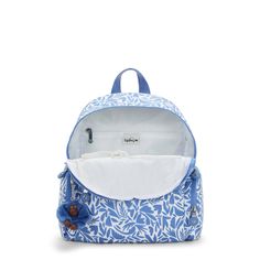 a blue and white backpack with flowers on the front, zippered closures and an inner pocket